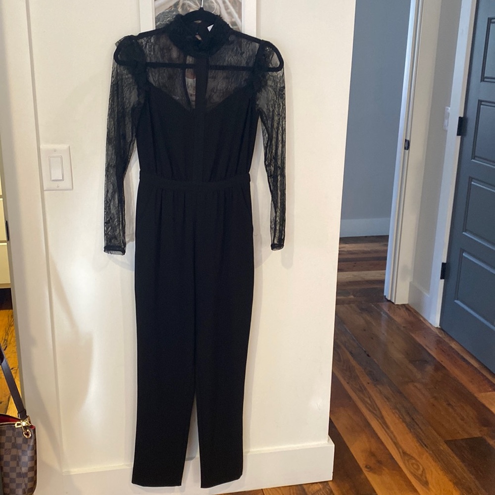 Ali and Jay black xs jumpsuit worn once